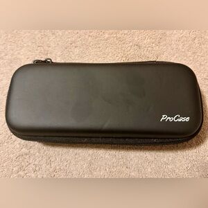 New:Pencil case, vegan leather, two compartments, black. Line yarn for carrying.